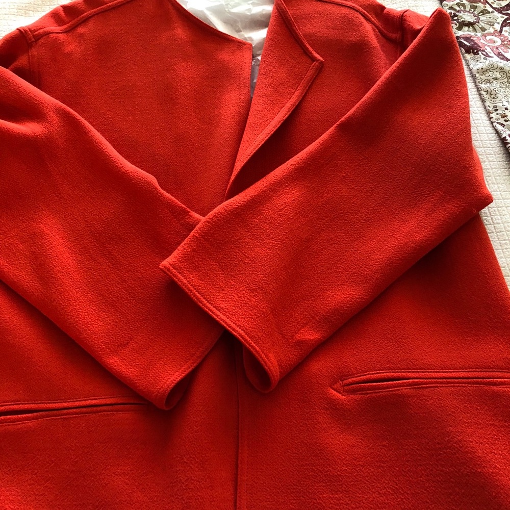 Emanuelle Ungaro orange jacket and skirt